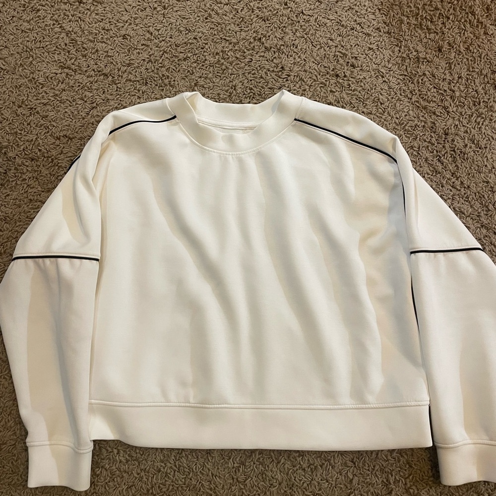 White crewneck box sweatshirt from dicks sporting goods with black outline